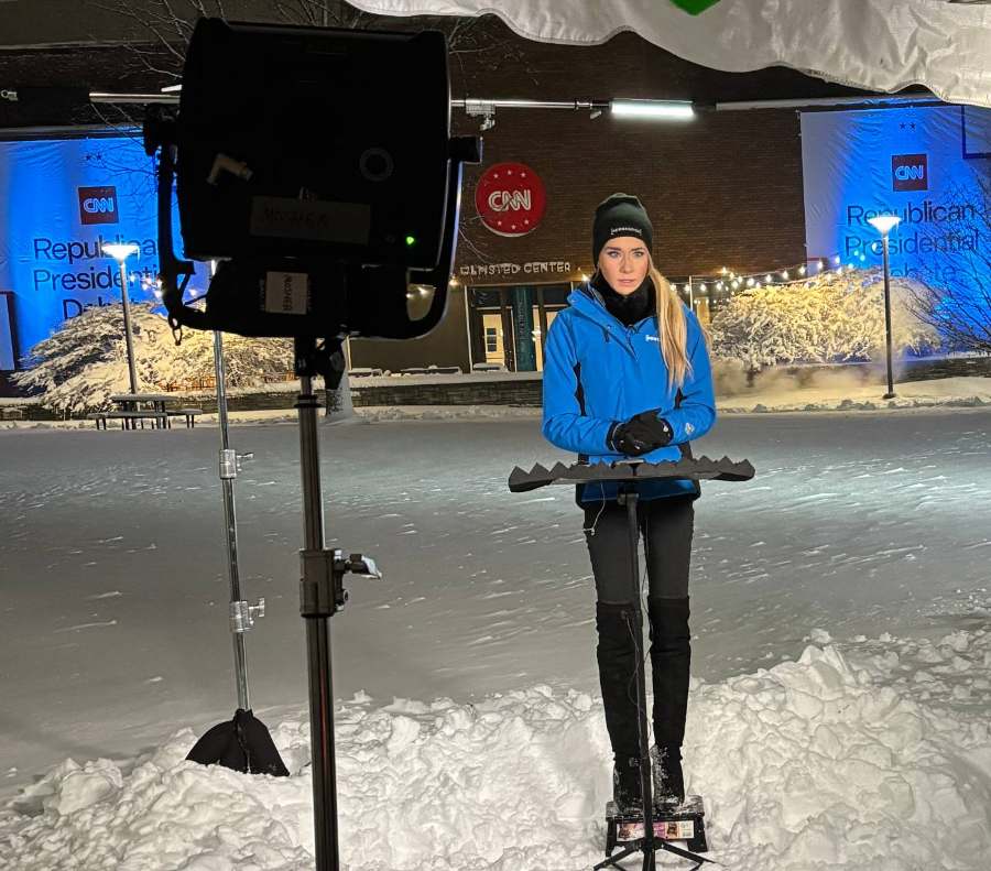 Emily reporting for NewsNation outside the CNN debate site in the snow
