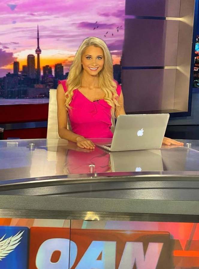 Emily at the OAN anchor desk