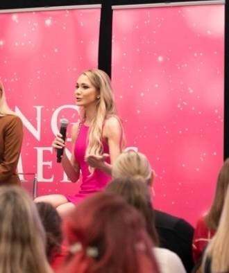 Emily speaking on a panel