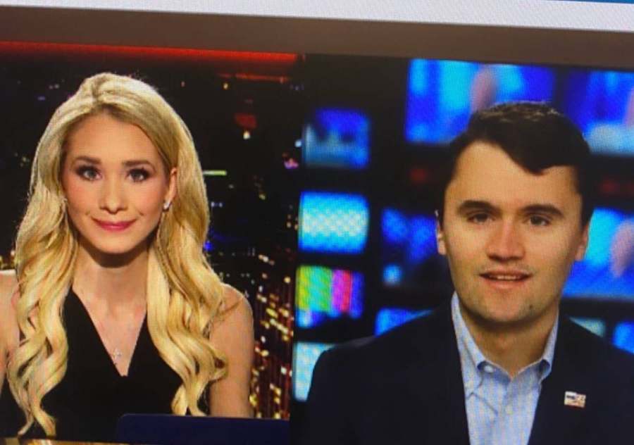 Emily interviewing Charlie Kirk in studio